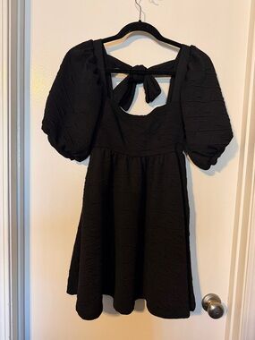 Free People Women’s Black Puff-Sleeve Babydoll Dress with back bow. NWT